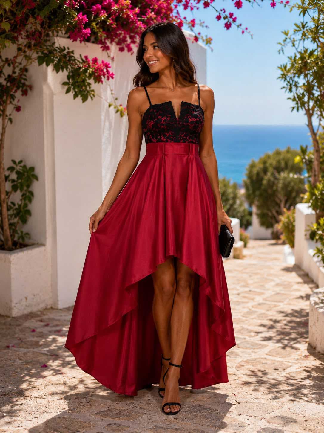 Abito rosso con corpetto in pizzo nero